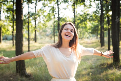 Preview: Young Beautiful Caucasian Female Enjoying The Sun In Park