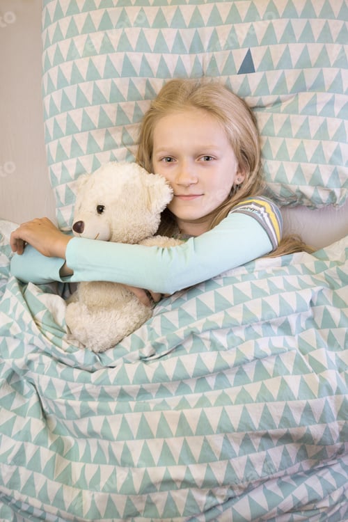 Preview: Little Girl Lies In Bed And Dreams Before Bedtime. Sleep And Health