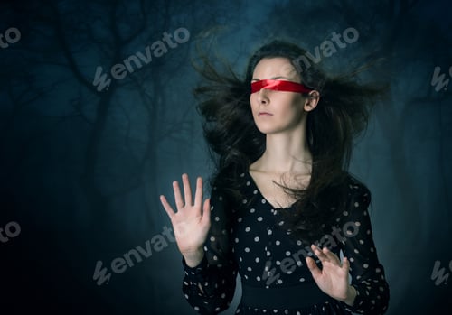 Preview: A Young Woman, Blindfolded With A Red Ribbon, Is Groping Through A Dark Forest.