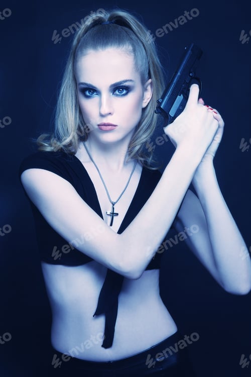 Preview: Beautiful Young Slim Sexy Woman With Revolver In Hand