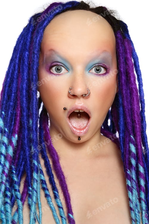 Preview: Portrait Of Stylish Freaky Girl With Blue Dreads And Shocked Expression