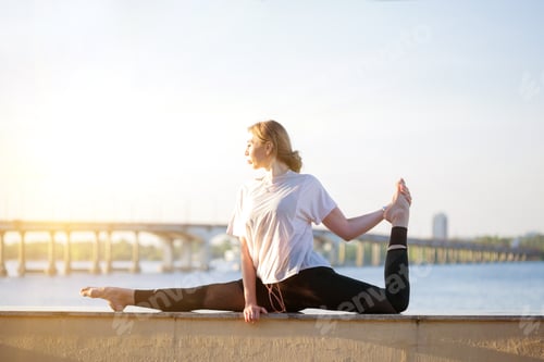 Preview: Healthy And Fly Yoga Concept. Fitness - Beautiful Girl Sitting On A Twine