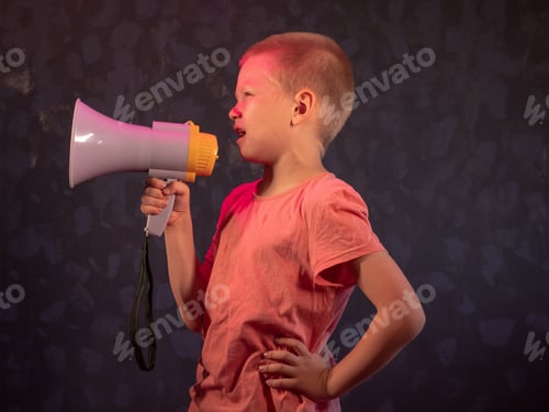 Preview: Child Screaming Into Loudspeaker. Kid Shouting Through Megaphone. Communication Concept. Black