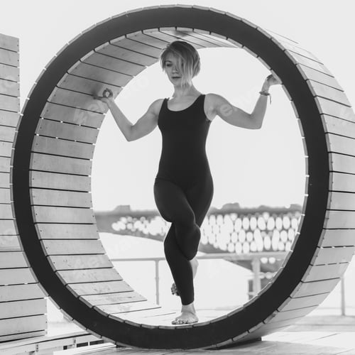 Preview: Beautiful Girl Doing Yoga In A Ring On The Beach