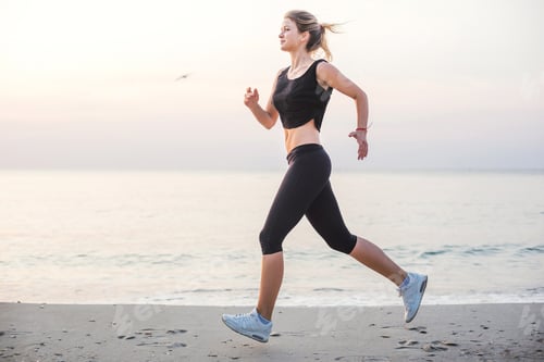 Preview: Running Woman. Female Runner Jogging During The Sunrise On Beach.
