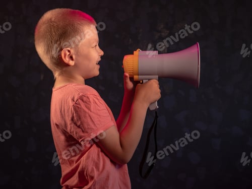 Preview: Child Screaming Into Loudspeaker. Kid Shouting Through Megaphone. Communication Concept. Black