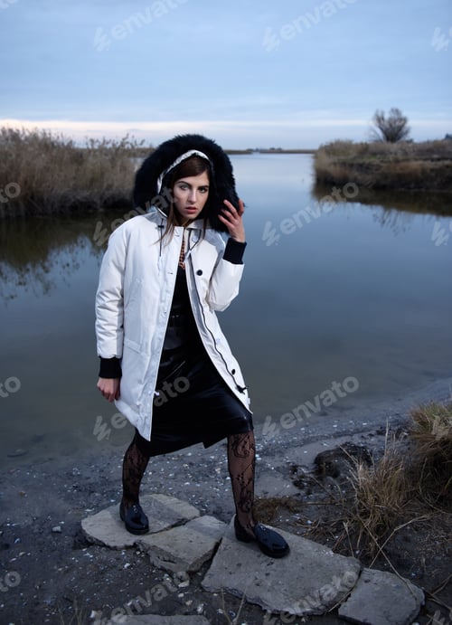 Preview: Fashion Shooting, A Girl In Winter Clothes Against The Background Of The River, A Professional