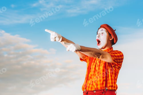 Preview: Actor Shows Pantomime Against The Blue Sky