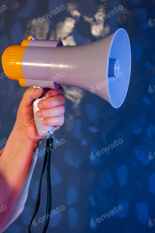 Preview: Beautiful Senior Woman Is Excited, Euphoric, Screaming With Megaphone, Sign Of Revolution And