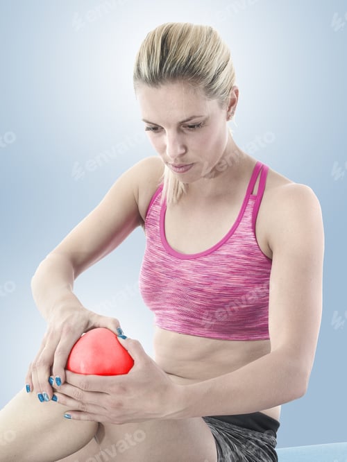 Preview: Pain In Knee. Female Holding Hand To Spot Of Knee.