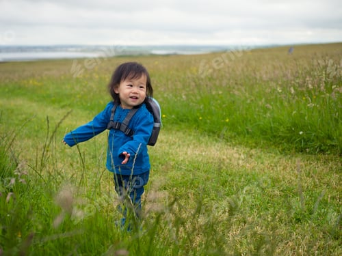 Preview: Litte Backpacker Traveling In Northern Ireland