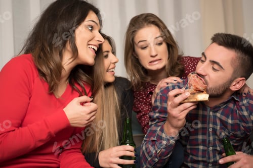 Preview: Friends Having Fun At Home Eating Pizza Drinking Beer And Leafing. Friends Having Fun Concept