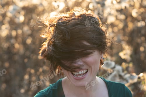 Preview: Portrait Of A Girl Shakes Her Head Standing In A Field