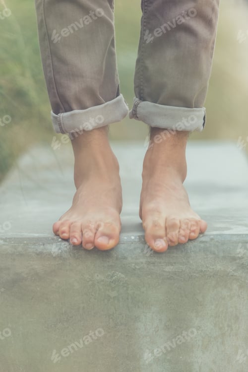 Preview: Young Handsome Man With Short Hair And Beard Wearing Suspenders And Posing Bare Feet