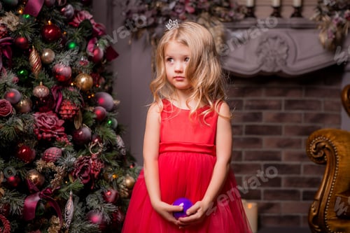 Preview: Little Blonde Girl In Evening Red Dress Near The Christmas Tree, Child With Christmas Gifts, The