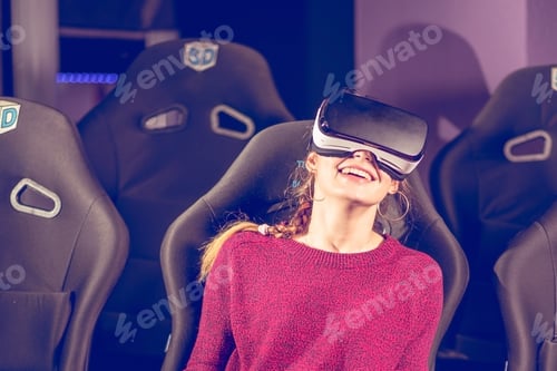 Preview: Beautiful Girl In Virtual Glasses Is Watching A Movie With Special Effects