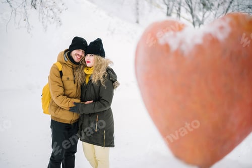 Preview: Beautiful Couple Is Photographed Near The Stone Heart
