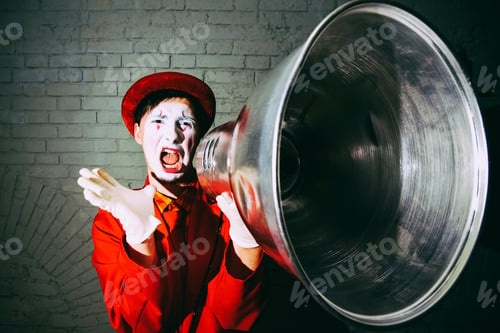 Preview: The Actor Took A Metal Lampshade And Pretends To Shout Into The Shout