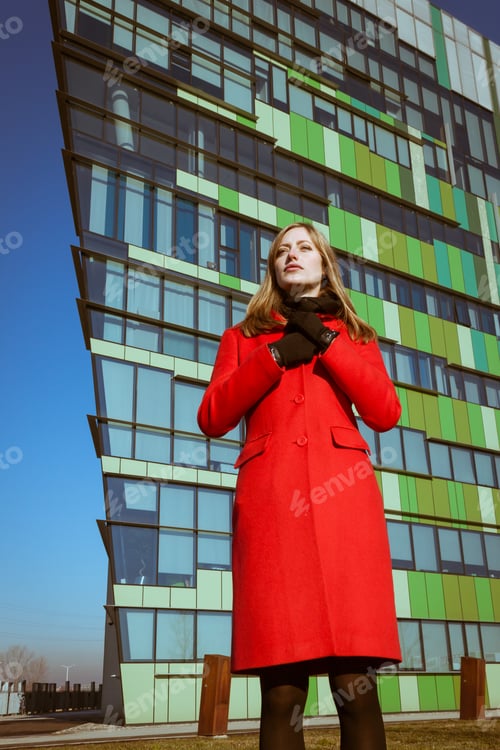 Preview: Beautiful Girl Posing In The Street With Red Coat