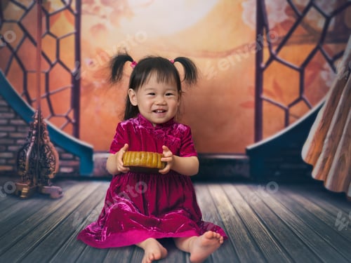 Preview: Baby Girl Eating Chinese Moon Cake