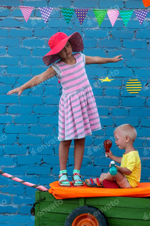 Preview: Three Happy Children Boys And Funny Girl Are Playing On Ship Made From Old Fishing Boat. Brothers