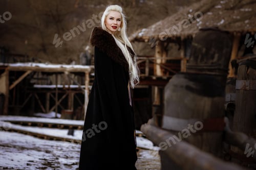 Preview: Beautiful Blonde Viking Dressed In A Black Cloak Against The Backdrop Of The Castle. Beautiful Film