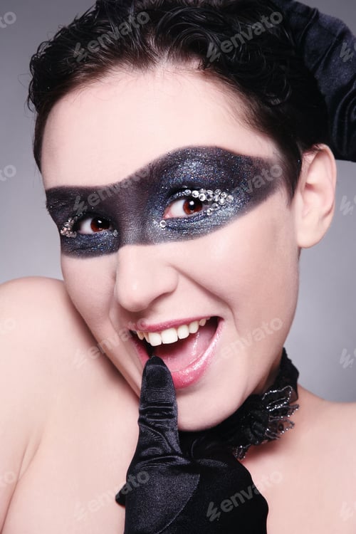 Preview: Woman with Creative Makeup and Playful Expression