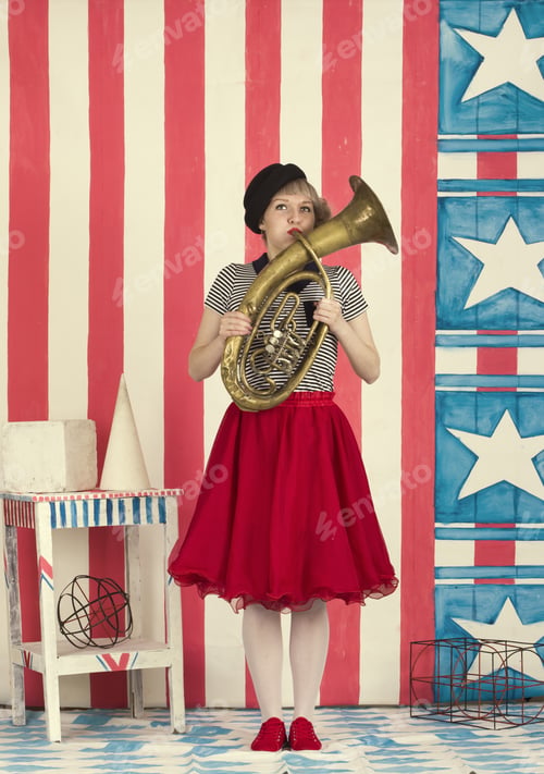 Preview: Funny Girl Playing On Trumpet. Circus Clown.