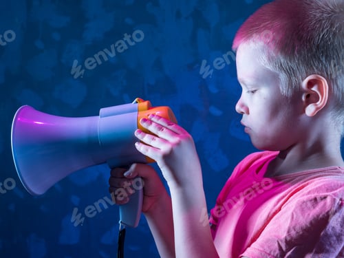 Preview: Child Screaming Into Loudspeaker. Kid Shouting Through Megaphone. Communication Concept. Black