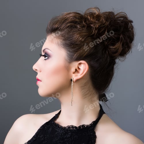 Preview: Woman in Profile with Updo and Earrings