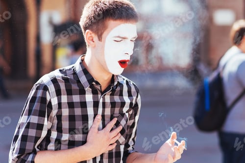 Preview: Man Mime Smokes A Cigarette In Town
