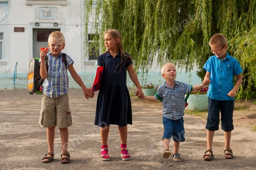 Preview: Children Return To School. Beginning Of New School Year After Summer Holidays. Boys And Girl With