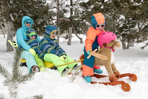 Preview: Happy Mother With Children In Sunglasses And Bright Blue Ski Suit. Mother And Boys Are Happy