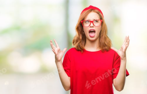 Preview: Young Beautiful Woman Over Isolated Background Crazy And Mad Shouting And Yelling With Aggressive