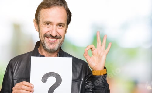 Preview: Handsome Middle Age Man Holding Paper With Question Mark Doing Ok Sign With Fingers, Excellent