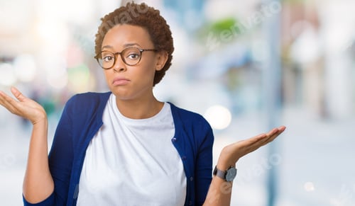 Preview: Young Beautiful African American Woman Wearing Glasses Over Isolated Background Clueless And