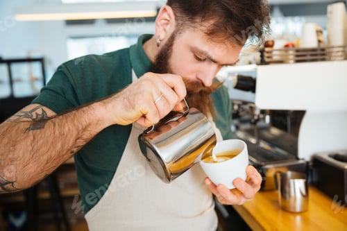 Preview: Barista Making Cappuccino In Coffee Shop