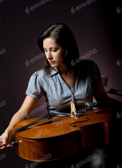 Preview: Preparing To Perform, Beautiful Young Cellist Woman Checking Her Instrument.