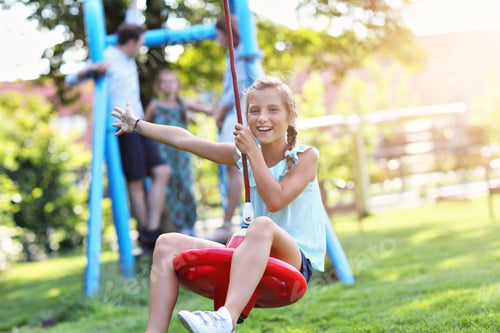 Preview: Joyful Family Having Fun On Playground