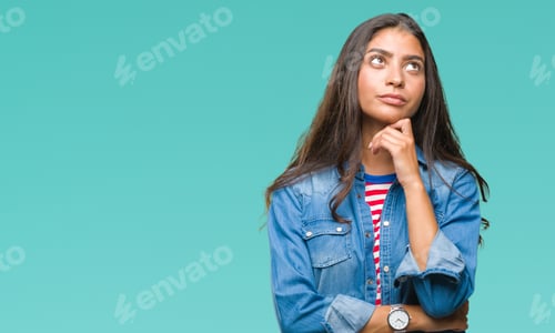 Preview: Young Beautiful Arab Woman Over Isolated Background With Hand On Chin Thinking About Question