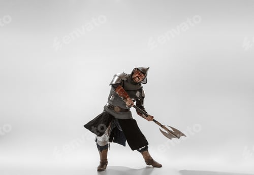 Preview: Brave Armored Knight With Professional Weapon Fighting Isolated On White Studio Background