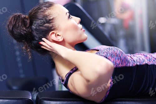 Preview: Picture Of Fit Woman Doing Sit Ups In Gym