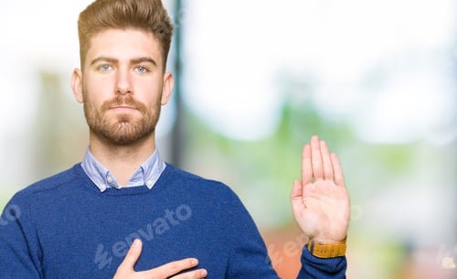 Preview: Young Handsome Bussines Man Swearing With Hand On Chest And Open Palm, Making A Loyalty Promise Oath