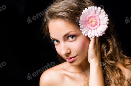 Preview: Beauty Shot Of Gorgeous Brunette Decorated With Flower, On Black Background.