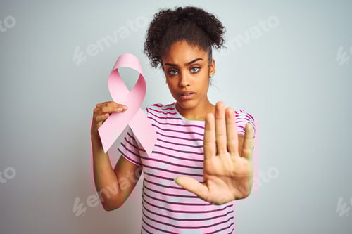 Preview: Young African American Woman Holding Cancer Ribbon Over Isolated White Background With Open Hand