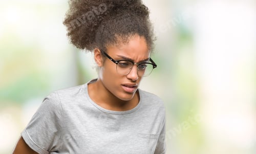 Preview: Young Afro American Woman Wearing Glasses Over Isolated Background With Hand On Stomach Because