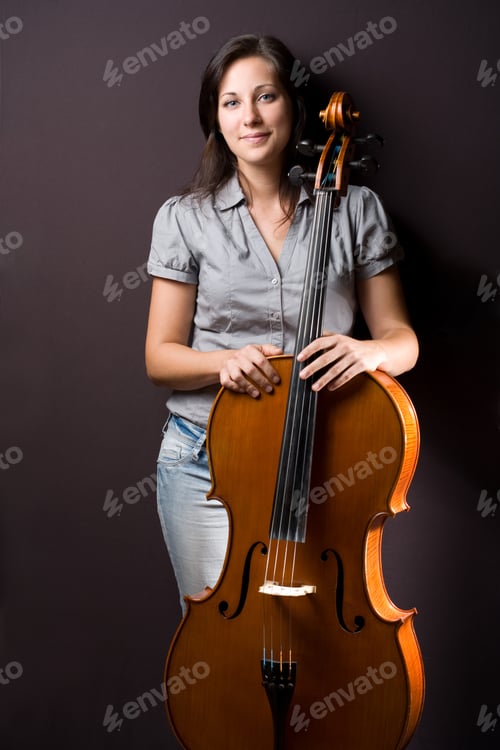 Preview: Portrait Of A Gorgeous Young Classical Musician Woman With Her Cello.