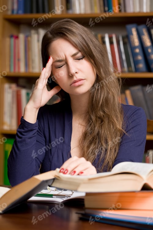 Preview: Portrait Of Stressed Out Looking Beautiful Young Student Woman.