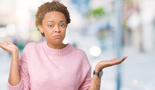 Preview: Beautiful Young African American Woman Over Isolated Background Clueless And Confused Expression
