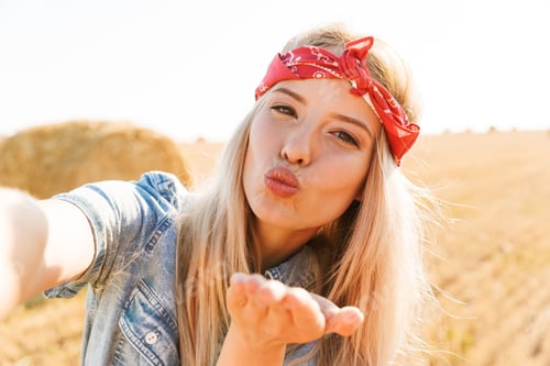 Preview: Beautiful Smiling Young Blonde Girl In Headband At The Wheat Field, Taking A Selfie, Sending Kiss